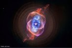 Nebulosa é uma nuvem de gás e de poeira de um meio interestelar. A Imagem mostra a Nebulosa Olho de Gato ou NGC 6543. <br /><br /> Palavras-chave: Astronomia, gravitação universal, hubble, estrela, nebulosa olho de gato.